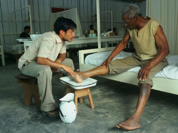 Ernesto cures a patient with leprosy.