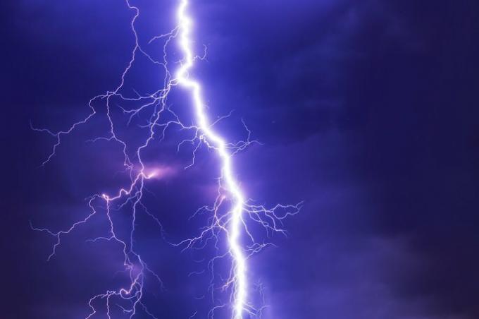 lightning bolt crossing the sky like a physical phenomenon