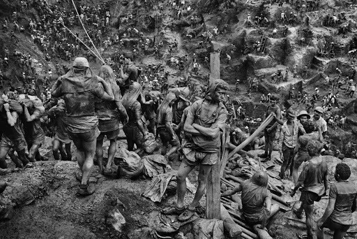 Photograph of Sebastião Salgado two workers from the Mines